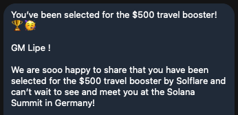 A post announcing a travel boost competition between two companies, Gm and Solfloare, is displayed with an emoticon depicting a happy smiley face below the text. The email message encourages participants to share their experience of using the travel booster for at least $500, stating that this was selected for the $500 travel booster challenge.