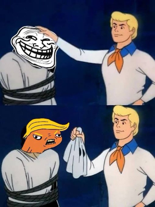 A two-panel Scooby-Doo meme showing Fred unmasking the villain in the top panel, with the unmasked villain revealed to be the 'Wojak'/'Doomer' character in the bottom panel.