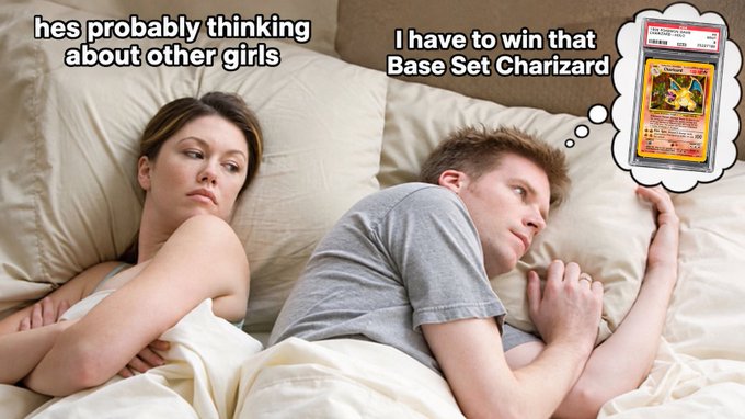 A meme showing a couple in bed facing away from each other, with text 'hes probably thinking about other girls' over the woman and 'I have to win that Base Set Charizard' over the man, accompanied by a thought bubble showing a PSA 10 Charizard Pokémon card.