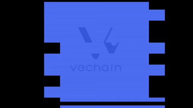 The image features a blue square with the word "VeChain" written across it, along with a logo of a cat's face. The background of the image is black, which contrasts with the blue square and makes the text stand out. The caption below the image reads "5 years ago, I made my very first crypto Video. This Video was the first Video about crypto I created, it was about VeChain. I compare it with the videos i create these days & all I can see is growth."