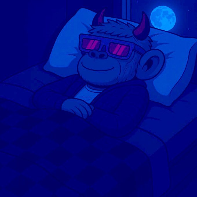The image features a cartoon monkey wearing glasses, lying down on a bed with blue sheets. The caption of the image reads "GN CT FAM @wallchain and @KaitoAI are coming back?" which suggests that there might be an upcoming event or gathering related to the characters in the image.