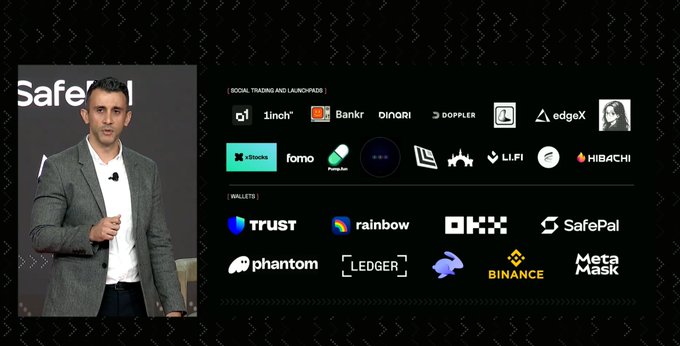 A man presents alongside a slide showcasing cryptocurrency partners, including social trading platforms (a16z, 1inch, Bankr, Dinari, Doppler, edgeX), exchanges (Binance, OKX), and wallets (Trust, Rainbow, Phantom, Ledger, SafePal, MetaMask), highlighting Minara's integration within the crypto ecosystem featured in an Arc livestream.