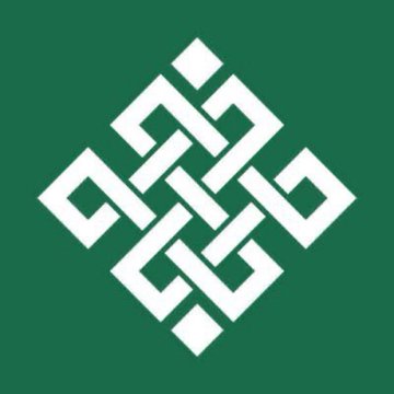 A green background features a white geometric endless knot symbol, an ornamental design often associated with Buddhist iconography, formed by interlaced lines in a symmetrical square pattern.