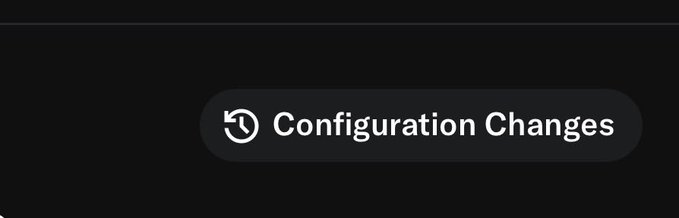 The image shows a "Configuration Changes" button or notification badge on a dark interface, featuring a clock/history icon. This relates to the post about OpenSea's new feature that displays configuration changes on mints, allowing users to detect suspicious modifications during the minting process.