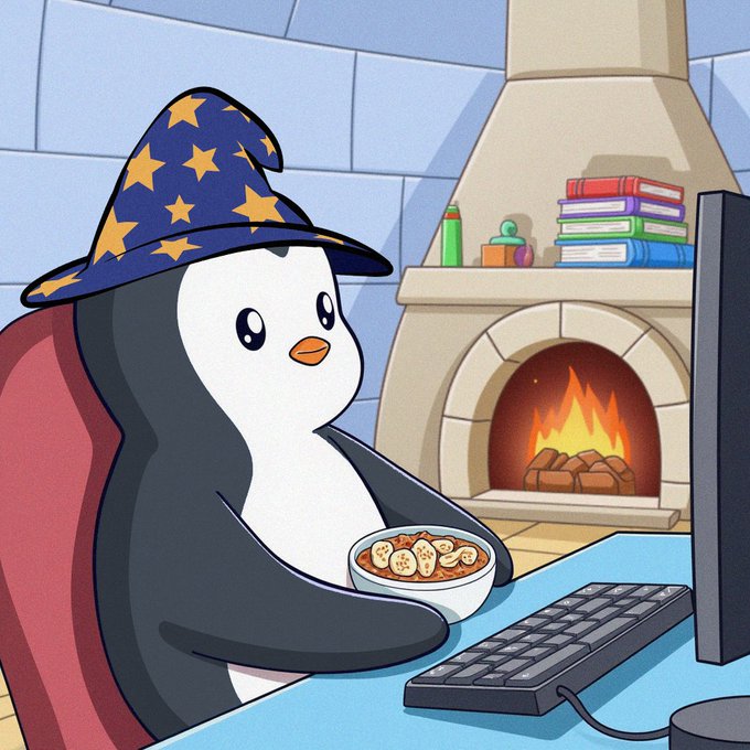 A cartoon illustration of a penguin wearing a blue wizard hat with yellow stars, sitting at a computer desk and holding a bowl of food, with a lit fireplace in the background.