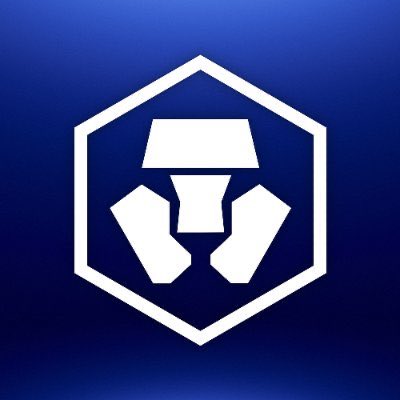 A blue gradient background displaying the white hexagonal Crypto.com (CRO) logo.
