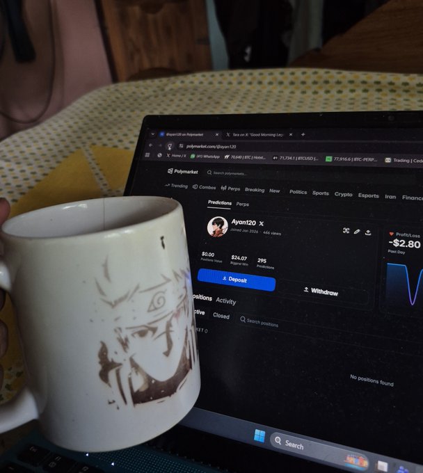 A white ceramic mug featuring an anime character (Naruto) sits in front of an open laptop displaying the Polymarket prediction platform with a profile for 'Ayant20' showing a -$2.80 profit/loss.