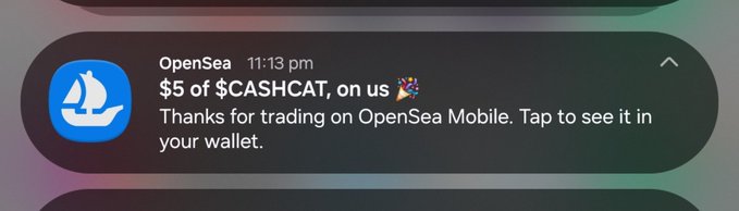 A phone notification from OpenSea at 11:13 pm thanks the user with "$5 of $CASHHCAT, on us" for trading on OpenSea Mobile, tying into the post's gratitude toward OpenSea.