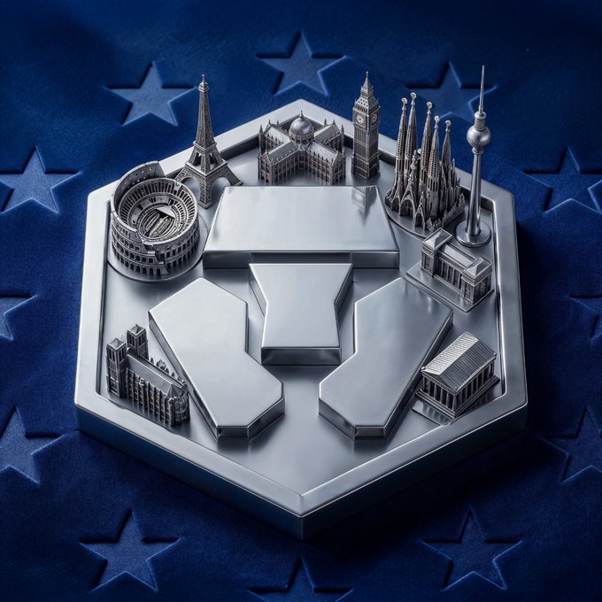 A metallic hexagonal emblem featuring miniature European landmarks (Eiffel Tower, Big Ben, Sagrada Familia, Colosseum, etc.) encircling a stylized crypto logo, all resting on a blue EU star-patterned background.

The image visually reinforces the post's message by showcasing iconic EEA landmarks surrounding the Crypto.com emblem, symbolizing the platform's full licensing and regulatory legitimacy across European markets while highlighting the new 10% deposit reward incentive.