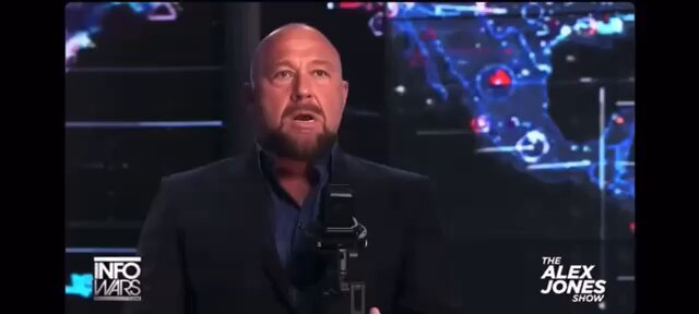 The image features a man wearing a suit, standing behind a microphone with his hands at his sides. He appears to be giving a speech or presentation, possibly related to cryptocurrency or technology. The caption of the image reads "I don't care what Bitcoin does we aren't selling our $LUNC!!! Bring it on you nerds!". This message seems to be directed towards a specific audience and could be part of an advertisement or promotional campaign for Bitcoin or other cryptocurrencies.