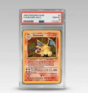 A graded PSA 10 1999 Pokemon Game Charizard-Holo card encased in a protective slab, showing the iconic fire-type Pokemon with 120 HP.