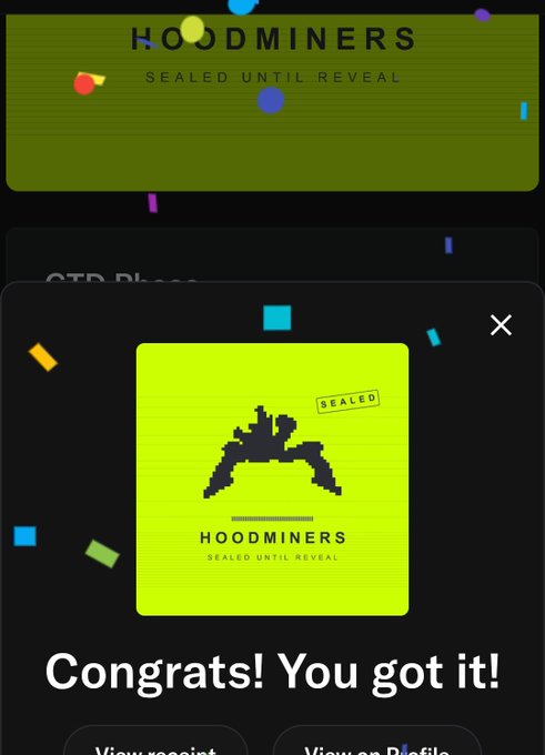 A mobile app notification displaying 'Congrats! You got it!' with a 'HOOMINERS' digital collectible card marked 'SEALED' against a green background.
