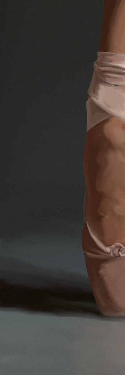 A close-up, partial image showing a person's torso wrapped in light-colored fabric or clothing against a dark blue-gray background.