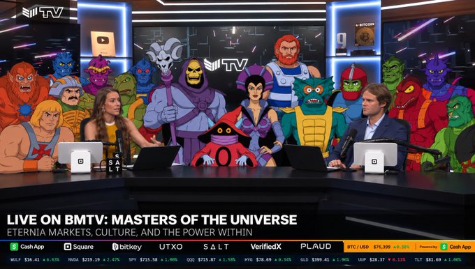 A live BMTV broadcast features two hosts at a desk surrounded by life-sized cutouts of classic Masters of the Universe characters like Skeletor, He-Man, and Beast Man, with the on-screen text reading "LIVE ON BMTV: MASTERS OF THE UNIVERSE — Eternia Markets, Culture, and the Power Within," fitting the post's celebration of a strong first week for the network.