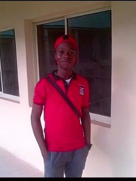 A young man in a red shirt and cap stands outside a building. The post "USDT self na skincare." suggests he might be promoting or representing a beauty product, emphasizing a focus on personal care.