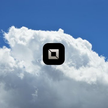 A black square app icon with a stylized white shape inside, centered against a background of a bright blue sky with fluffy white clouds.