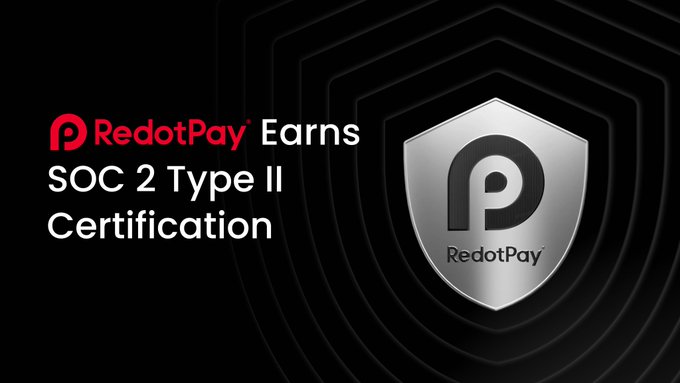 The image features a promotional graphic with a black background displaying the "RedotPay" logo in red and white, alongside the text "Earns SOC 2 Type II Certification." A silver shield emblem with the RedotPay "P" logo is prominently shown on the right, symbolizing security and trust. The graphic visually reinforces the accompanying post's announcement of RedotPay achieving SOC 2 Type II certification, highlighting the company's commitment to data protection in stablecoin payments.
