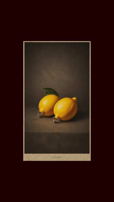 A vintage-style photograph showing two yellow lemons with green leaves resting on a dark surface, framed with a beige border and the word "Lemons" at the bottom.