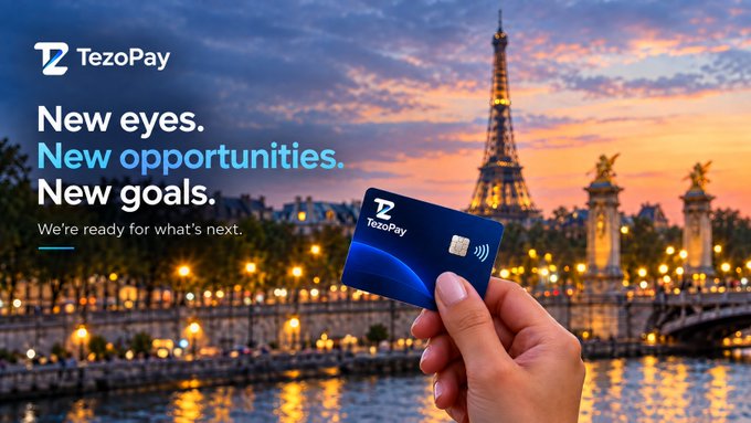 A TezoPay advertisement showing a hand holding a TezoPay card against a Paris sunset backdrop featuring the Eiffel Tower, with the tagline 'New eyes. New opportunities. New goals. We're ready for what's next.'