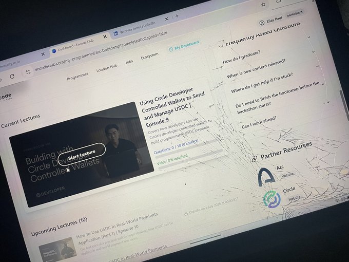 A laptop screen displaying the Encode Club dashboard showing a 'Building with Circle Developer Controlled Wallets' bootcamp page with a 'Start Lecture' button and FAQ section.