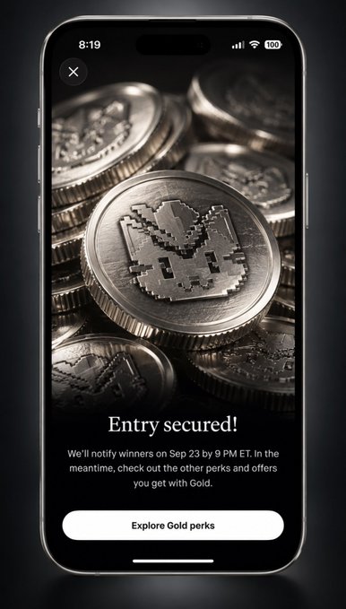 A smartphone screen displaying an 'Entry secured!' message about a giveaway, featuring a background of silver coins and text reading 'We'll notify winners on Sep 23 by 9 PM ET.'