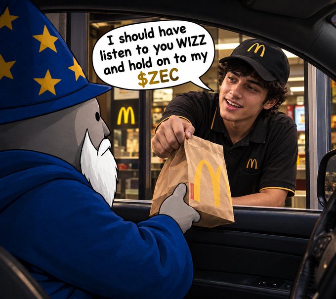 At a McDonald's drive-thru, a cheerful employee wearing the brand's black cap and uniform shirt hands a paper bag with the golden arches logo through the car window to a wizard-like figure in a blue robe and star-adorned pointed hat. The wizard remarks, "I should have listen to you WIZZ and hold on to my $ZEC," humorously connecting the fast-food "wiz" to Zcash ($ZEC) cryptocurrency, suggesting a regretful crypto trader turning to McDonald's after missing gains.