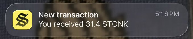 A mobile notification from a yellow 'BS' icon stating 'New transaction: You received 31.4 STONK' at 5:16PM.