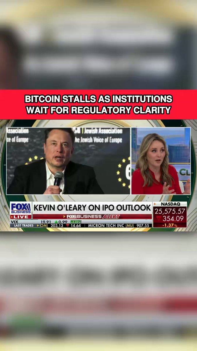 The image shows a news segment featuring two people, one man and one woman, discussing Bitcoin stands as institutions waiting for regulatory clarity. They are talking about the potential impact of Bitcoin on financial regulations and its implications for the economy. The background of the image is blurred, but it appears to be related to the topic being discussed in the news segment.

The post also includes a link to an article titled "Just Say $XRP Next Time..." which suggests that there might be more information or updates about Bitcoin and its impact on financial regulations coming soon.
