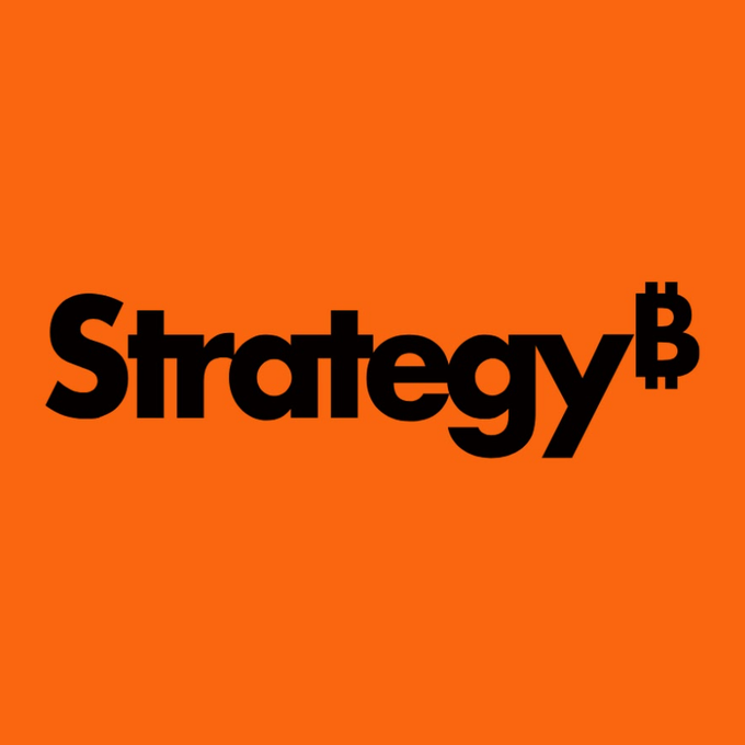 The word 'Strategy' in black text appears on an orange background, with a Bitcoin symbol (₿) replacing the final letter.
