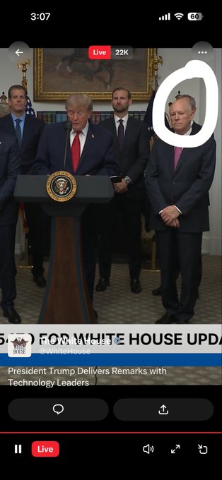 The image shows a White House livestream screenshot of President Trump delivering remarks with technology leaders, including what appears to be Apple's Tim Cook standing behind him. A white circle has been drawn around a person in the background, with the caption humorously asking if they're "hiding BRAD" - referencing the XRP community's playful speculation about the identity of the circled figure.