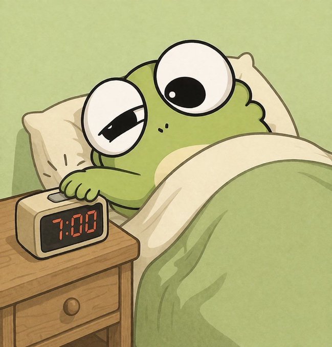 A tired cartoon frog lies in bed reaching to turn off an alarm clock displaying 7:00.