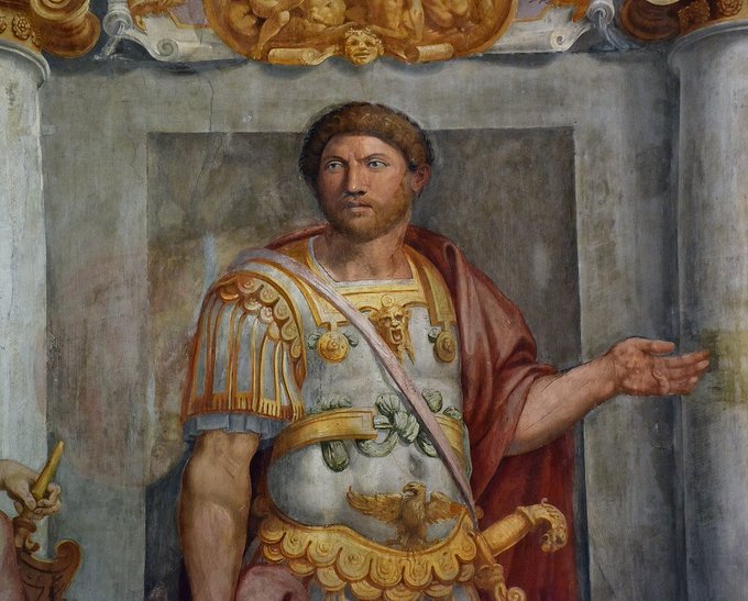 A Baroque-style fresco depicts a bearded man in elaborate Roman armor with golden detailing, a red cloak, and a laurel wreath, set within an ornate architectural frame. The regal, commanding figure and the "builders *with good ideas*" theme from the post evoke a visual metaphor for ambitious Uniswap v4 developers poised to "take over the financial world," like a conquering emperor claiming new territory.