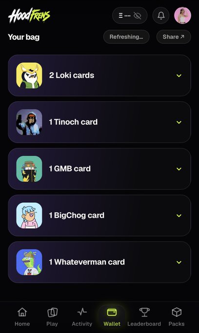 A screenshot of the "HoodFrens" app showing a digital wallet bag containing 2 Loki cards, 1 Tinoch card, 1 GMB card, 1 BigChog card, and 1 Whateverman card.