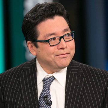 A man with dark hair and black-rimmed glasses, wearing a pinstripe suit and patterned tie, appears to be interviewed in a TV studio setting—likely Tom Lee, as referenced in the post discussing BitMine's $68 million ETH purchase and its goal of accumulating 5% of all Ethereum over the next 4-6 weeks.