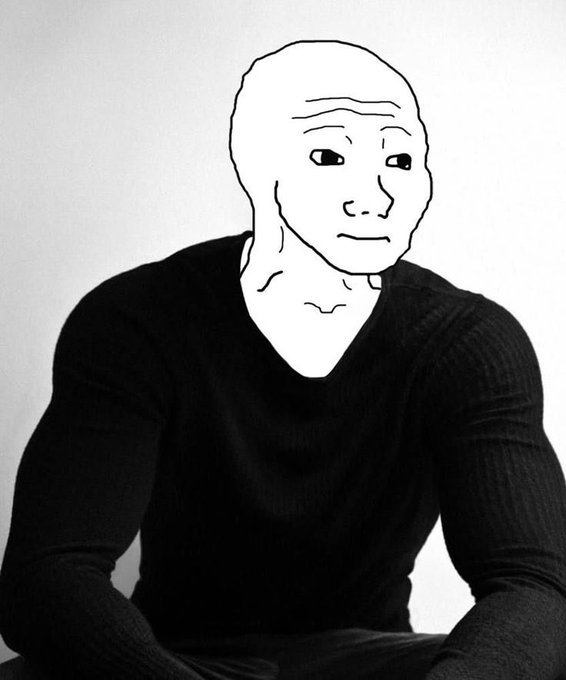 The image shows the "Wojak" meme character, a bald, somber-looking cartoon face superimposed on a real person's body wearing a black sweater. This relates to the post's "$Chegen Chad Degen" cryptocurrency reference, as Wojak memes are commonly used in crypto and meme coin communities to portray various character archetypes.