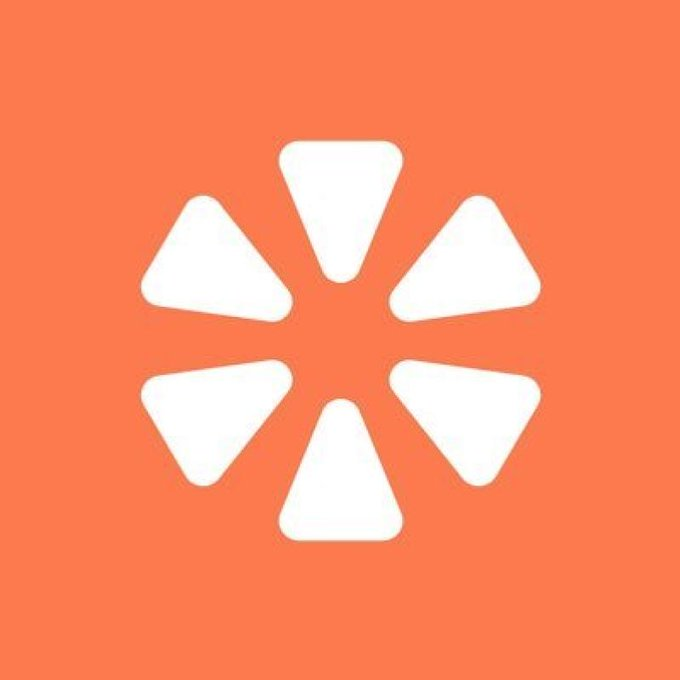 An orange square icon featuring a white stylized loading spinner or pinwheel logo composed of six triangular segments.