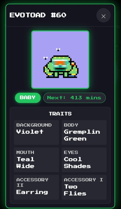 A digital interface card for "EVOTOAD #60" showing a pixelated green toad character on a violet background, labeled as a "BABY" with a countdown of "Next: 413 mins" and traits including Violet background, Gremlin Green, Teal Wide mouth, Cool Shades eyes, and Earring/Two Flies accessories.