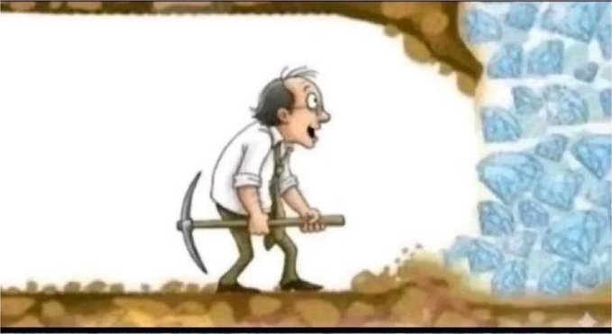 A 2D cartoon illustration of a balding man in a white shirt and tie holding a pickaxe, standing in a tunnel looking astonished at a wall of blue gemstones or crystals.