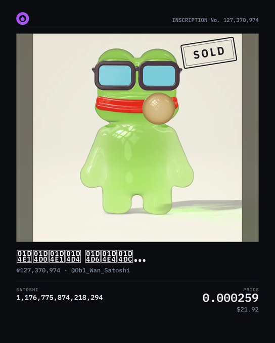 A digital listing shows a 3D green frog figurine wearing blue sunglasses and a red bandana blowing a bubblegum bubble, marked as 'SOLD' for 0.000259 SATOSHI ($21.92).