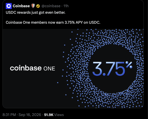 A Coinbase post from @coinbase announces that USDC rewards have improved, now offering 3.75% APY for Coinbase One members. The post is being shared critically, likely in response to Senator Hawley's "No" vote on the Clarity Act, suggesting the increased yield could accelerate deposit flight from traditional banks to crypto platforms.