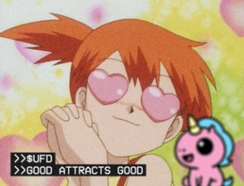 An anime character with orange hair and pink heart-shaped eyes smiles against a colorful background, with text reading '>>$UFD >>GOOD ATTRACTS GOOD' alongside a small creature.