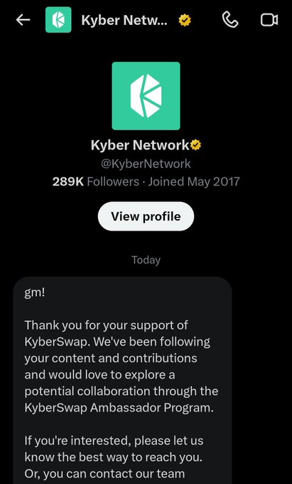 The image shows a message from a social media platform called Kyber Network. The message is displayed on a phone screen with a black background. It appears that someone has sent this message, possibly as part of an outreach campaign or promotional effort for KyberNetwork. The message includes a link to the Kyber Network website and mentions that they are interested in having new Brand Ambassadors join their team.