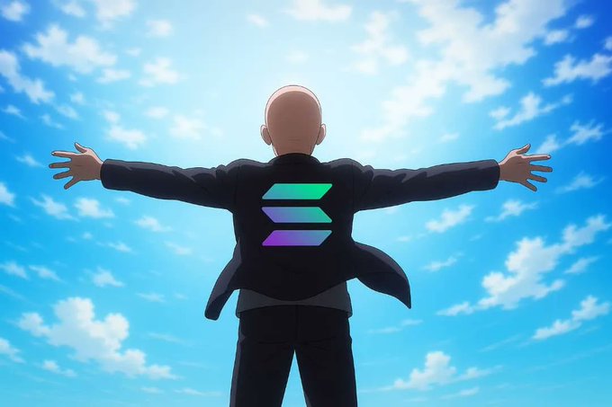 An animated bald character wearing a black jacket with a green and purple logo stands with arms outstretched against a bright blue sky.
