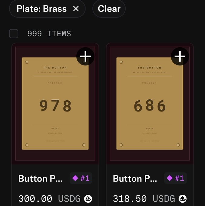 An NFT marketplace listing showing two brass 'Button Presser' plates numbered 978 and 686 priced at 300.00 and 318.50 USDG respectively, filtered by 'Plate: Brass'.