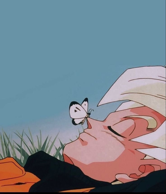 An anime-style illustration of Super Saiyan Goku lying peacefully on the grass with his eyes closed as a white butterfly rests on his nose.