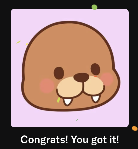 A cartoon beaver with pink cheeks and prominent front teeth smiles on a light purple background, with the text "Congrats! You got it!" below.