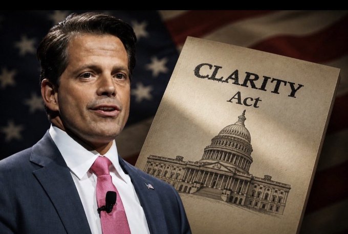 A man in a suit speaks in front of an American flag, with an image of the 'CLARITY Act' document overlaid beside him.