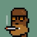 A small pixel art sprite of a brown-skinned character with dark hair holding a white object, set against a solid green background.