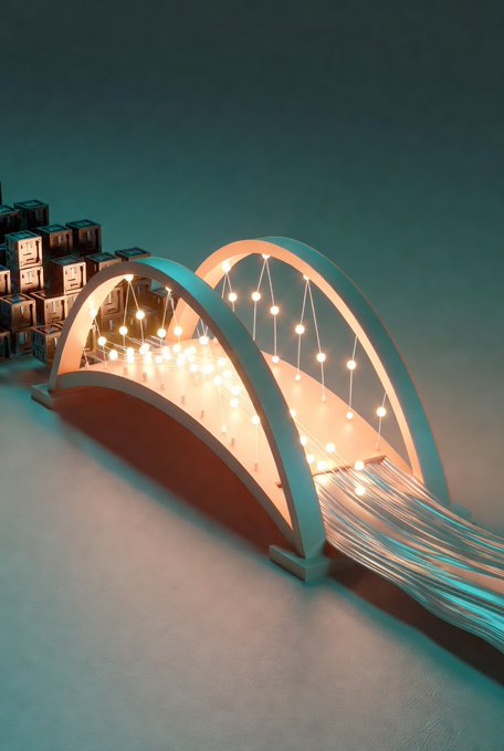 A miniature model of an arched bridge illuminated with string lights, connecting to fiber optic strands, sitting next to small server rack boxes.