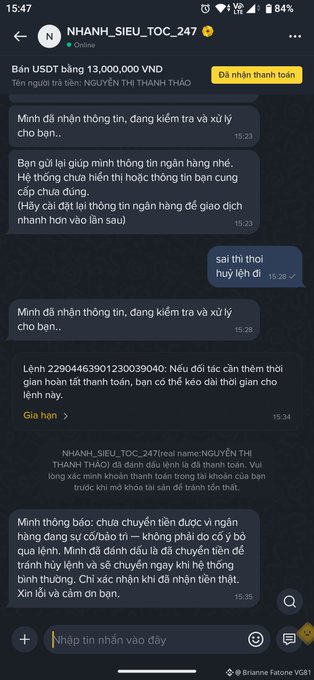 A Vietnamese-language Binance P2P chat between user "NHANH_SIEU_TOC_247" (NGUYEN THI THANH THAO) and support, showing a 13,000,000 VND USDT transaction where the seller warns about a common scam tactic where fraudsters prematurely mark orders as paid to trick buyers into releasing crypto before actual bank transfer confirmation. The exchange illustrates exactly the warning in the caption—highlighting how "nhấn thanh toán" (pressing payment) can be misused to deceive P2P traders.